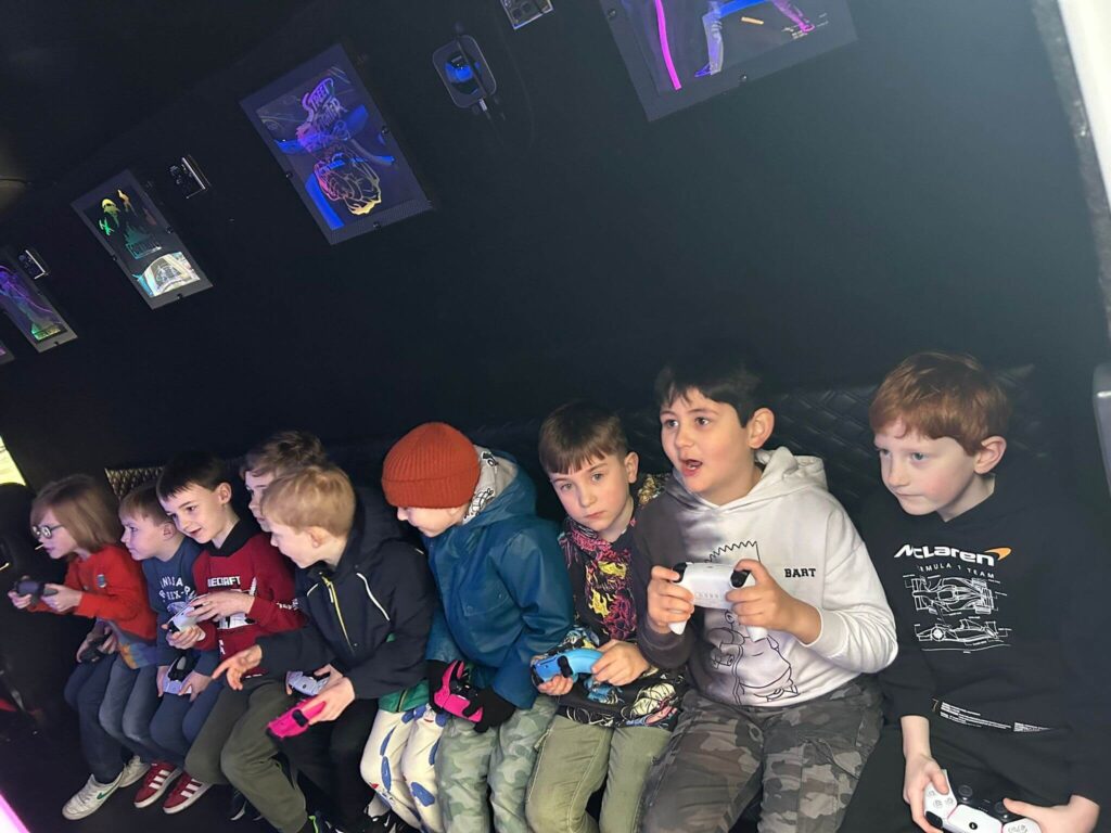 Children enjoy the gaming van